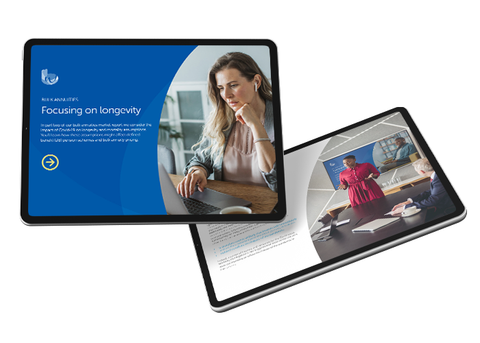 A tablet displays a presentation titled "Focusing on longevity." The action involves a woman engaged in the presentation while seated at a desk. The context includes a modern office environment with additional screens and people discussing.