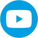 A blue circular icon features a white play button in the center. It signifies video content, commonly associated with online platforms for streaming and sharing videos.