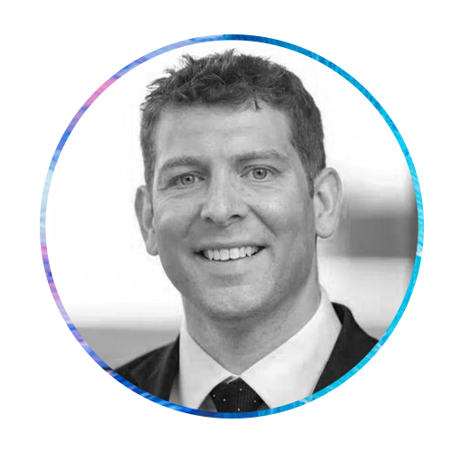 A smiling man with short hair and a suit is the focus, framed in a circular design. The background features abstract blue and pink colors, adding a modern aesthetic.