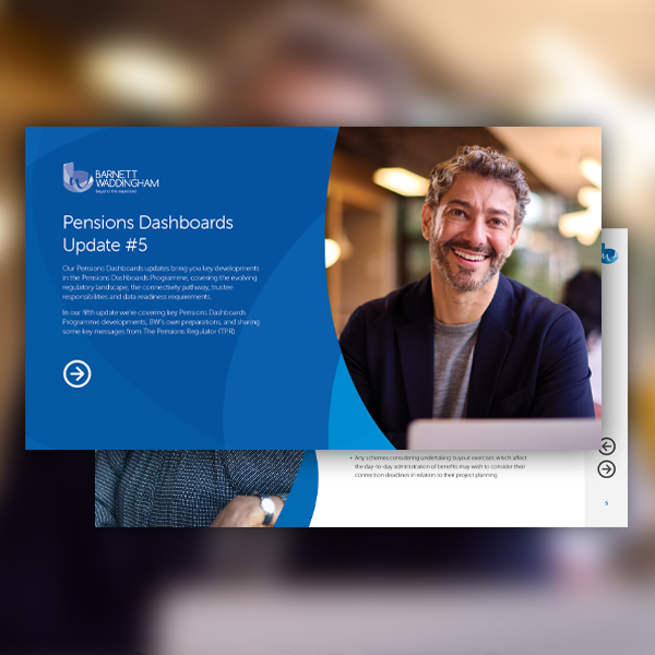 A smiling man in a casual shirt and blazer is looking at the camera. He is seated in a well-lit indoor setting, adorned with greenery, while a presentation slide titled "Pensions Dashboards Update #5" is displayed.