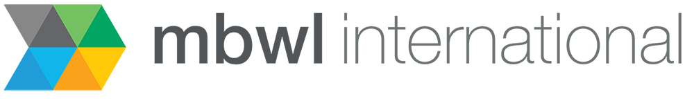 A colorful, geometric logo composed of various triangular shapes in different colors, prominently displaying the name "Verdant" in a bold, modern font on a plain gray background.