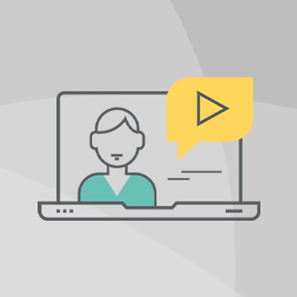 A laptop displays a simplified person’s icon with a speech bubble containing a play button, indicating communication or video interaction. The background is a light gray gradient.