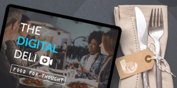 A tablet displays "THE DIGITAL DELI" alongside images of people engaging in conversation, while a neatly arranged fork and knife sit next to a folded napkin with a tag, suggesting a dining context. The text reads: "FOOD FOR THOUGHT."
