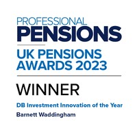 A rectangular award certificate prominently displays "PROFESSIONAL PENSIONS UK PENSIONS AWARDS 2023" at the top, followed by "WINNER" and the category "DB Investment Innovation of the Year" awarded to "Barnett Waddingham."