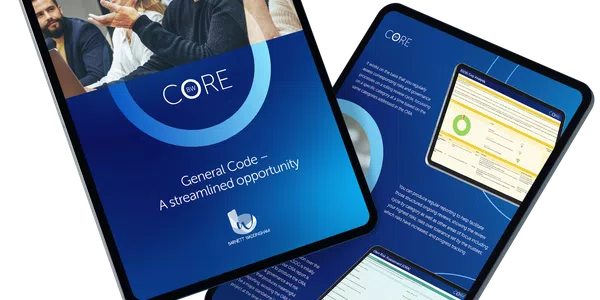 A digital tablet displays a report titled "CORE" with accompanying charts and graphs, while a group of engaged individuals in a conference room attentively discuss the content.