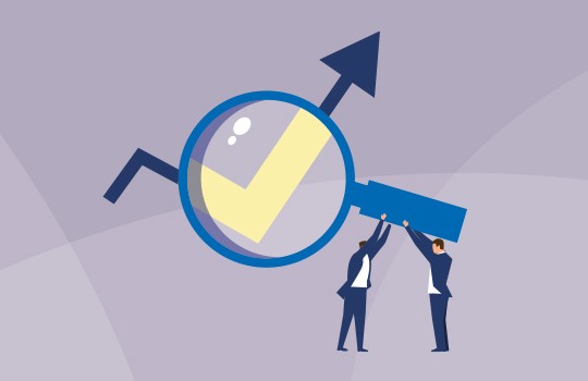 Two figures in business attire support a horizontal bar beneath a large magnifying glass featuring a checkmark, suggesting an emphasis on analysis or achievement in a minimalist, abstract background.