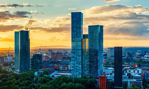 Manchester cityscape at sunset