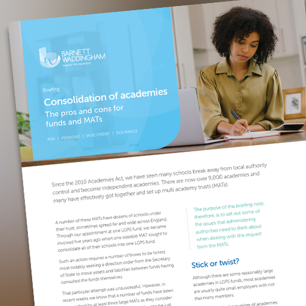 A woman with curly hair is sitting at a desk, reading a document. The context is a well-lit office environment, featuring a briefing titled "Consolidation of academies" with text discussing educational reforms.