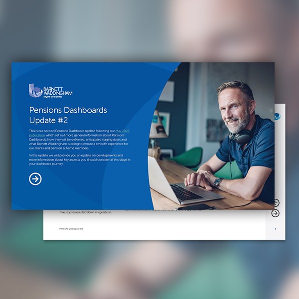 A man with headphones sits at a desk with a laptop, smiling while engaging in work. The background features colorful objects, and a blue panel displays "Pensions Dashboards Update #2" with company branding.