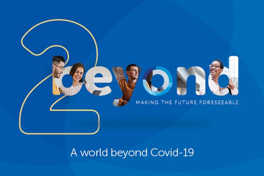 A large number "2" is prominently displayed, with the word "beyond" creatively incorporating images of diverse people. The context suggests a forward-looking theme about life after Covid-19, complemented by text. 

Text: "MAKING THE FUTURE FORESEEABLE" an