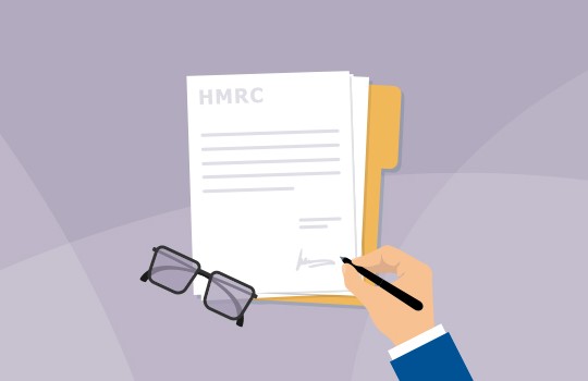 A hand holds a pen, signing a document labeled “HMRC,” while eyeglasses rest nearby. The background features smooth, muted colors, suggesting an office environment focused on paperwork.