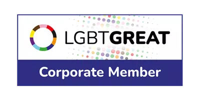 A logo features a multi-colored circular design alongside the text "LGBT GREAT" prominently displayed above "Corporate Member," set against a background of colorful dots.