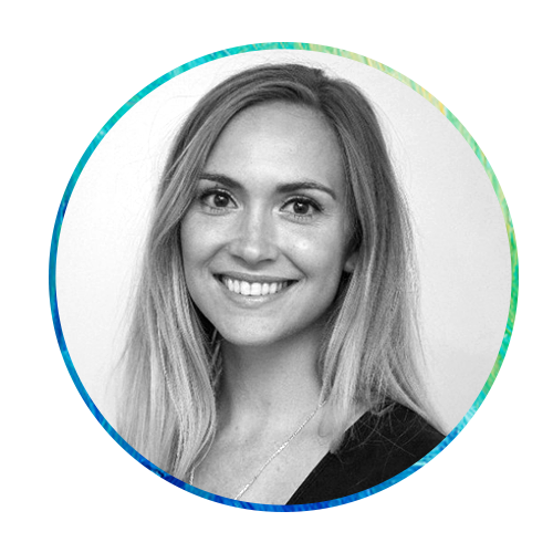 A woman with long, light brown hair smiles confidently in a circular frame. The background features vibrant blue and green abstract paint strokes, creating a lively context for her portrait.